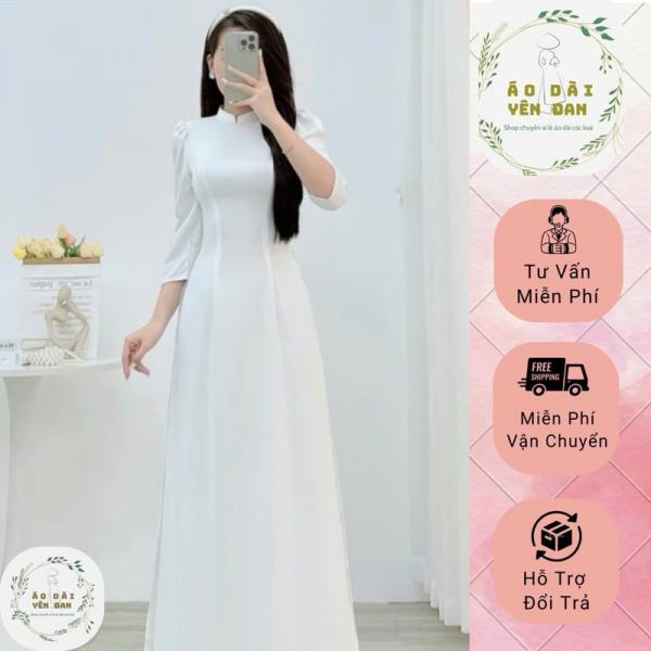 Áo dài trắng học sinh cổ cao , tay bồng lỡ chất vải lụa mĩ.